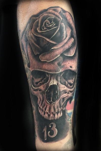 Realistic Skull rose morph black and grey  tattoo by Derek Dufresne Space Tiger Tattoos 2709 St Claude ave, New Orleans, LA