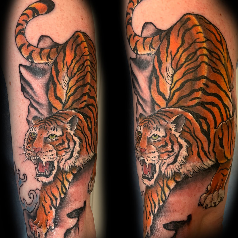 japanese asian tiger tora  tattoo by Derek Dufresne Space Tiger Tattoos 2709 St Claude ave, New Orleans, LA