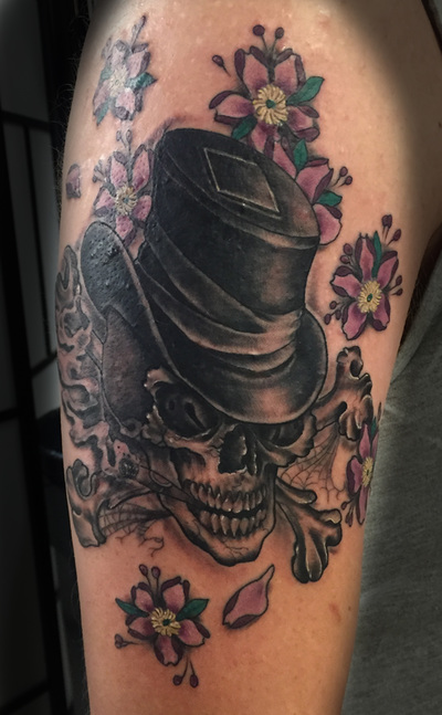 Mr lucky skull top hat cigar  tattoo by Derek Dufresne Space Tiger Tattoos 2709 St Claude ave, New Orleans, LA
